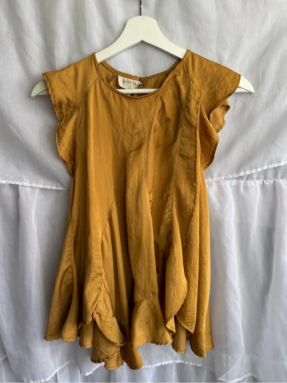 Koch Sleeveless Ruffle Blouse